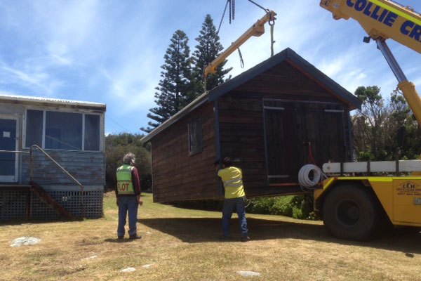 Rennovated Shed being craned into position